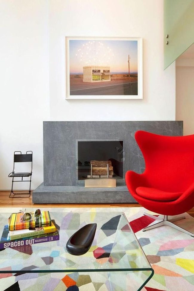 Red Chair, Gray Stone Fireplace