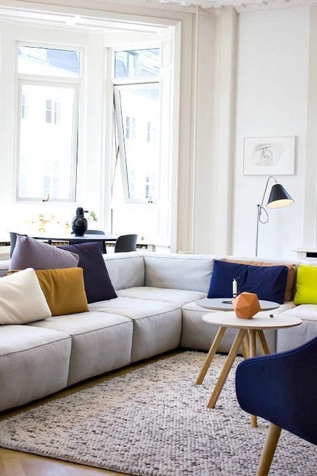 Gray Sofa With Jewel Tone Pillows