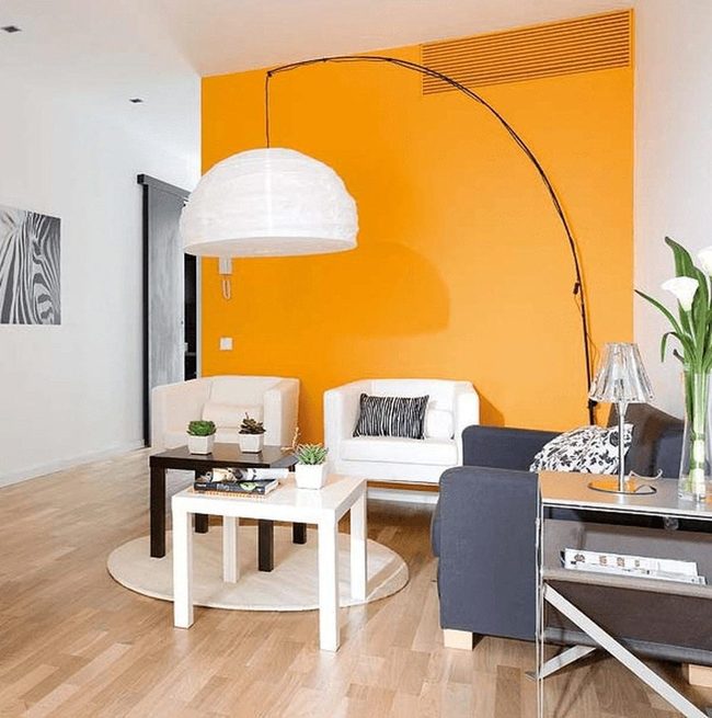 Bright Orange Living Room With Natural Wood