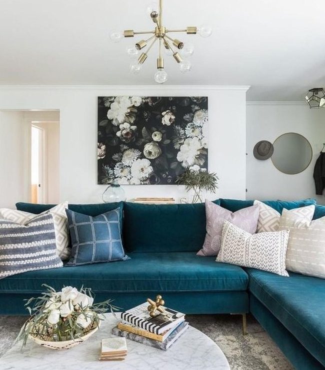 Deep Teal Sofa Steals The Room