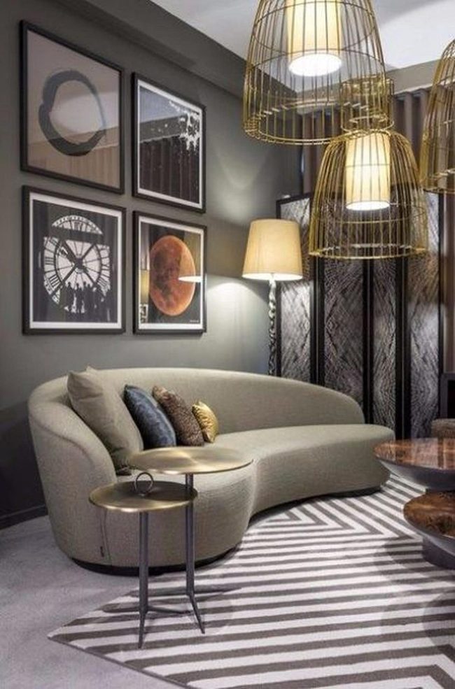 Curved Sofa With Geometric Wall Art