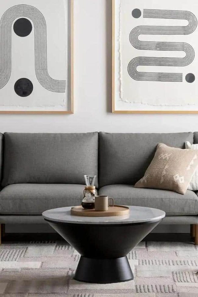 Deep Gray Sofa With Geometric Wall Art