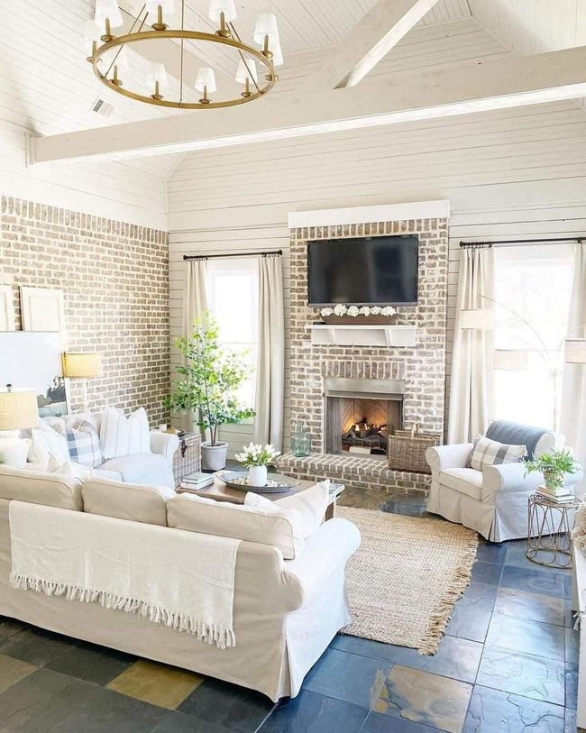 White Vaulted Ceiling Meets Brick Warmth