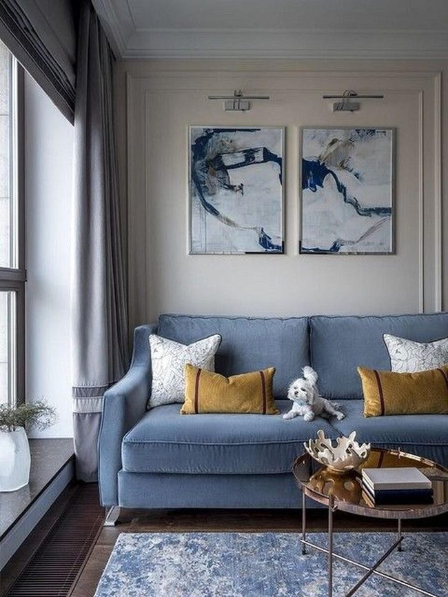 Blue-Gray Sofa With Golden Accents