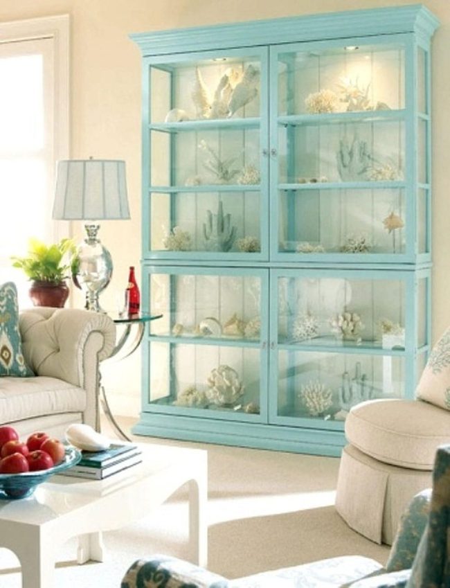 Blue Cabinets With Seashell Collections