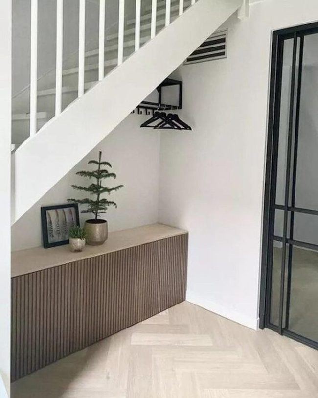 Black Glass Door Meets Minimalist Storage