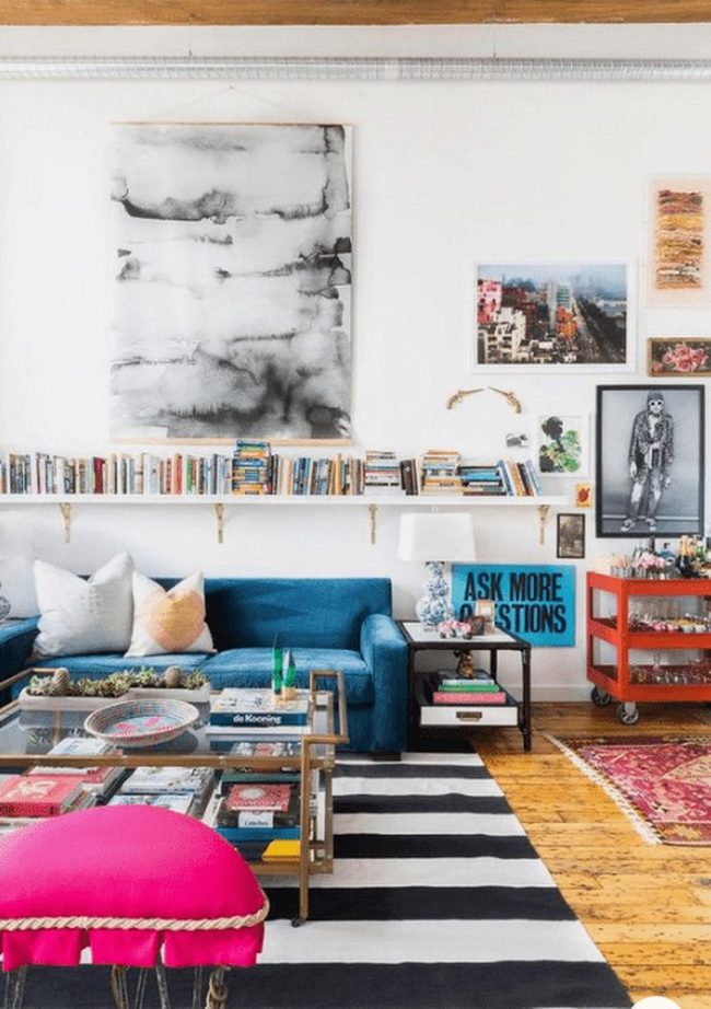 Blue Couches, Striped Rug, Colorful Books