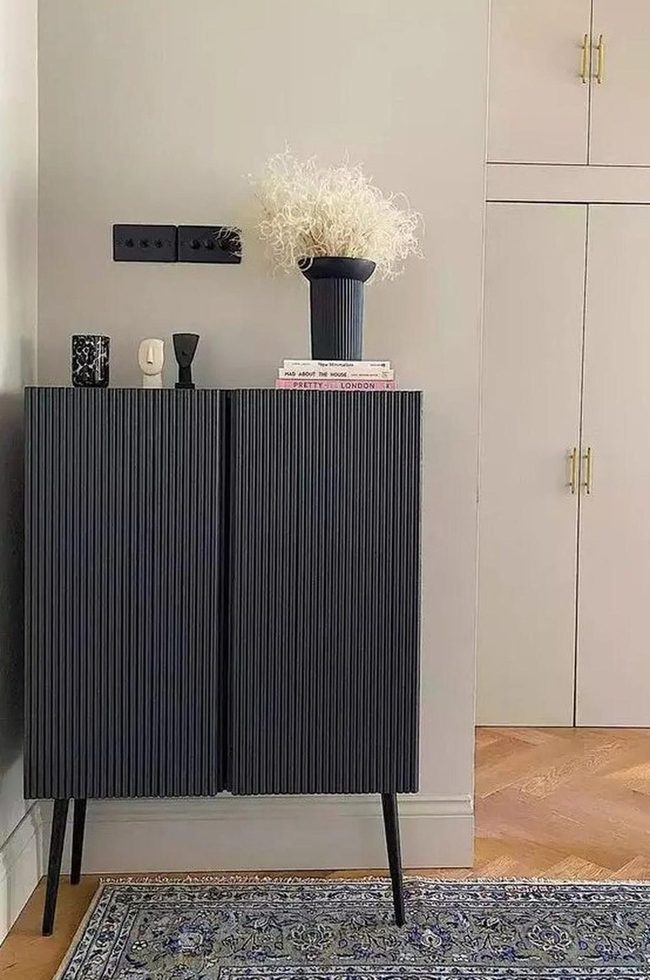 Black Cabinet With Airy Vertical Lines