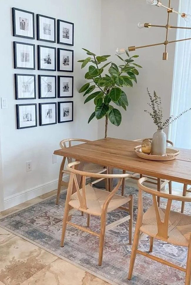 Natural Wood Dining Room With Greenery