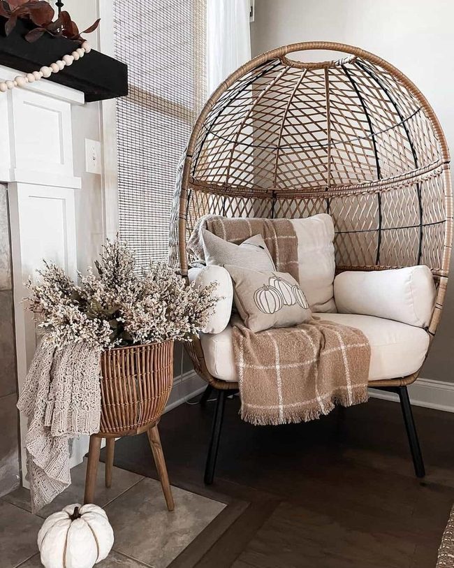 Egg Chair Meets Black Fireplace Mantel