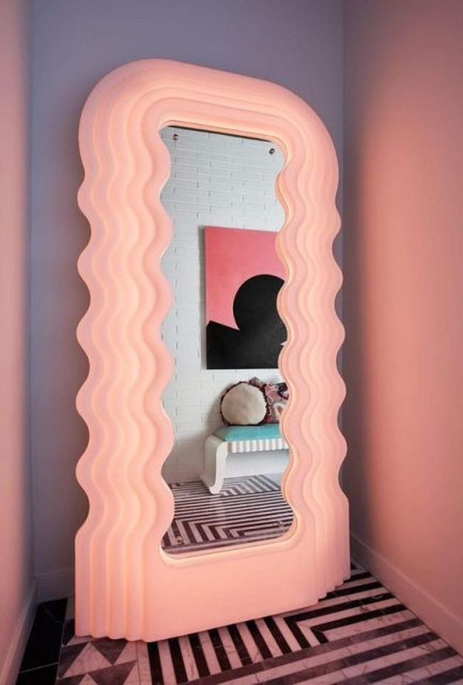 Pink Wavy Mirror Steals Modern Space