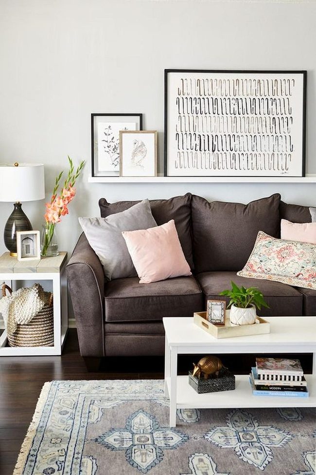 Gray Couch With Pastel Pink Pillows
