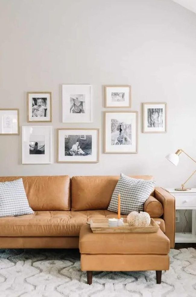 Tan Leather Seating With Gallery Wall