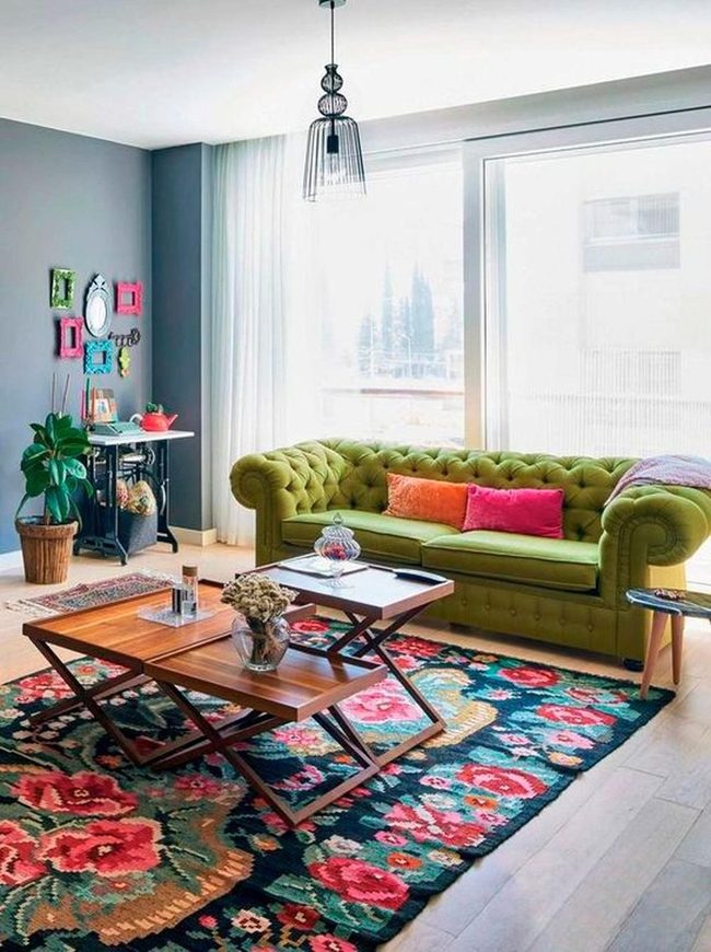 Green Velvet Sofa With Floral Rug