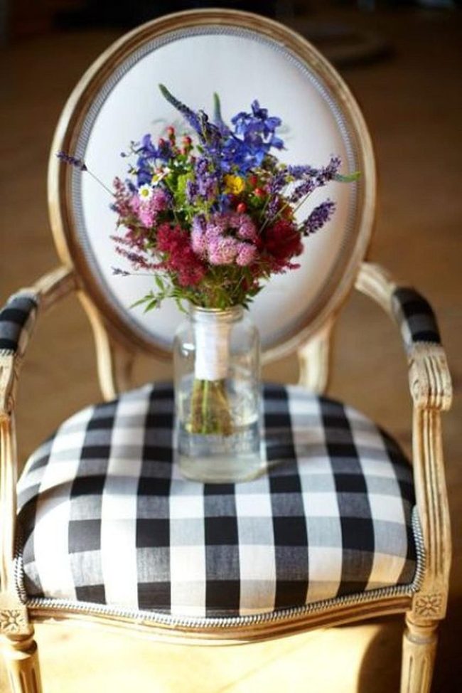 Overflowing Wildflowers Meet Carved Wooden Chair