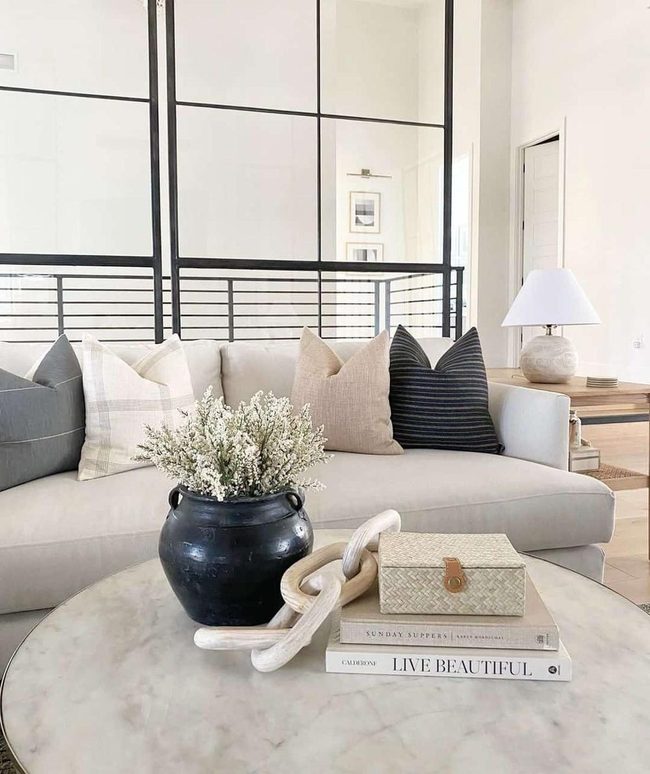 Oversized Wooden Table Anchors Gray Sofa