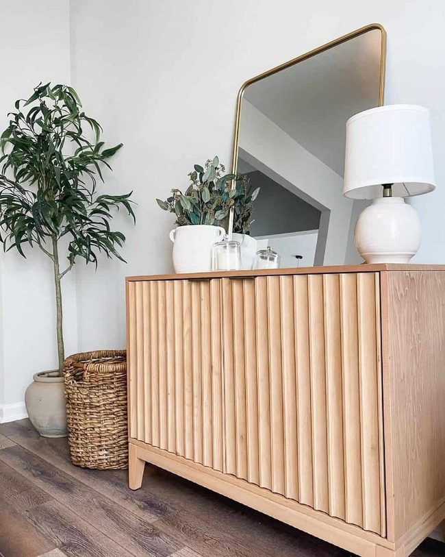 Brass Mirrors And Natural Wood