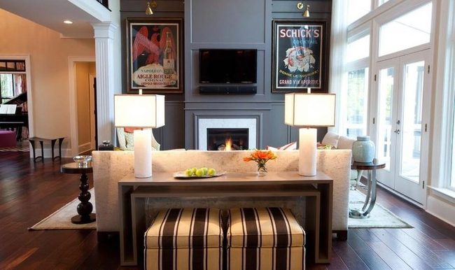 Gray Wall Fireplace And Vintage Posters