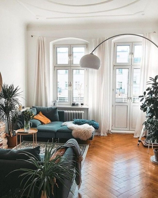 Deep Green Sofa, Living Plants, Wood