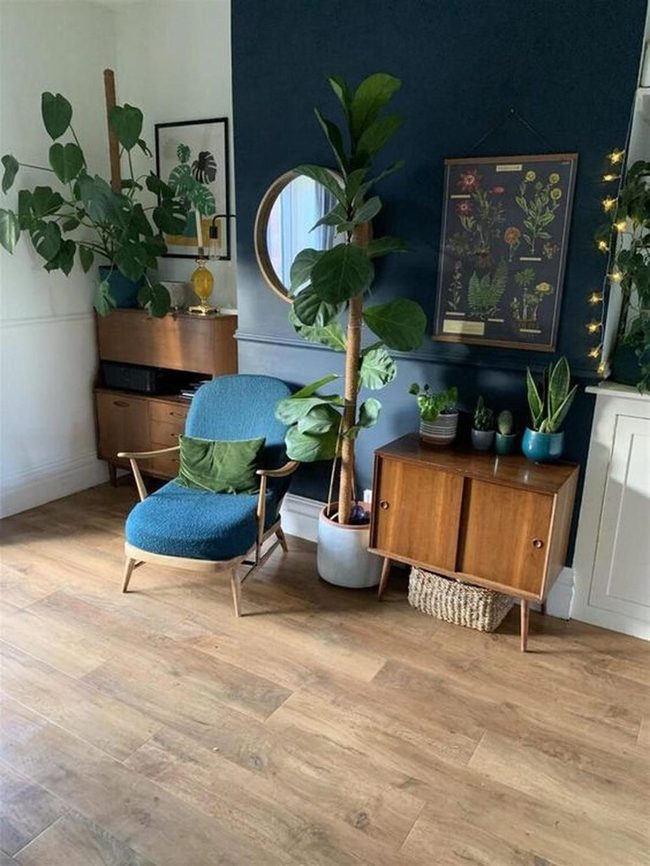 Deep Blue Walls With Green Botanical Accents