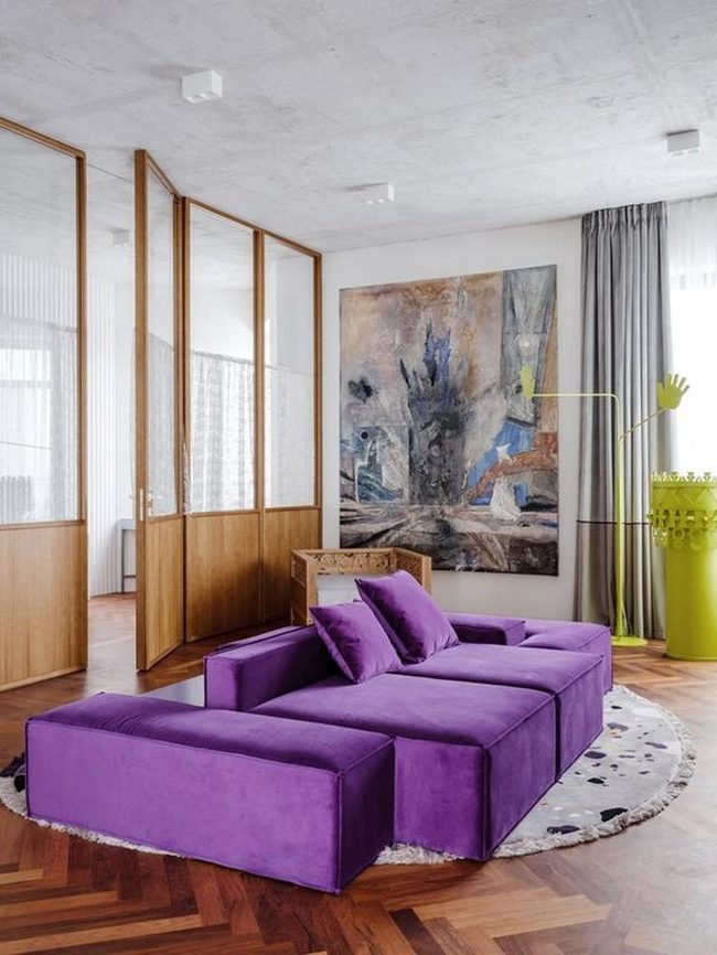 Purple Sofa Steals The Room