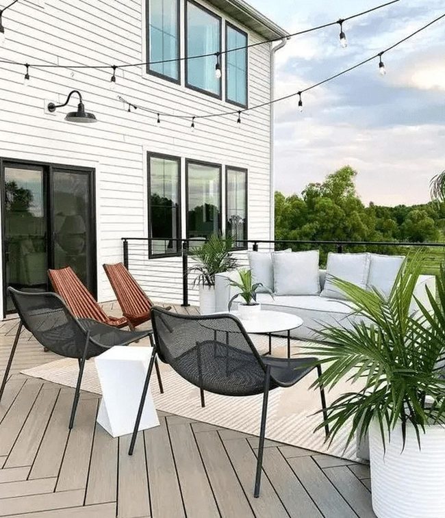 White Siding Modern Deck Oasis