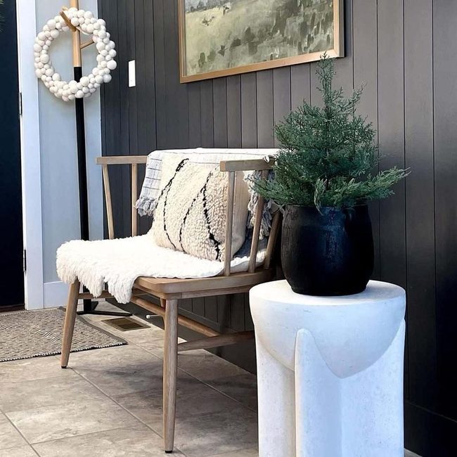 Black Planter Welcomes Guests Home