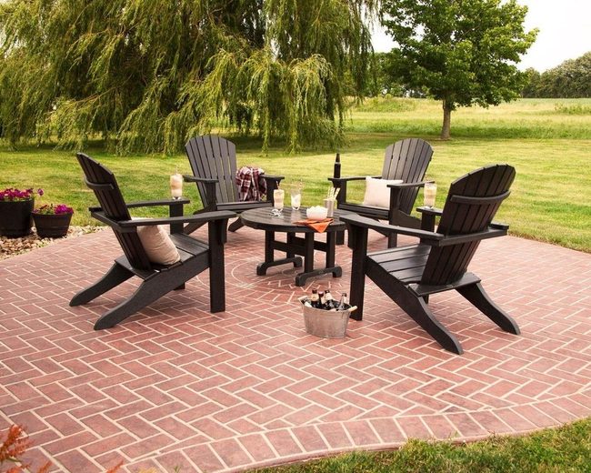 Black Chairs On Warm Brick