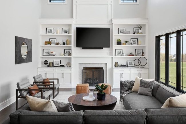 Black Tv Framed By Gallery Wall