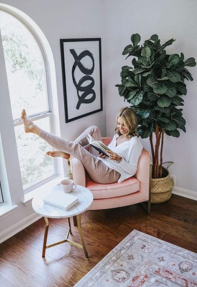 Pink Armchairs And Curved Light