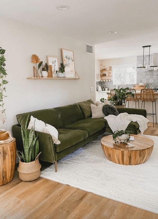 Green Sofa With Natural Wood Accents