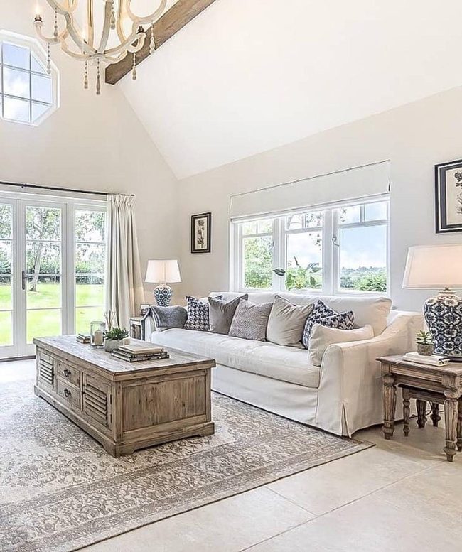Ivory Sofa Golden Chandelier Statement