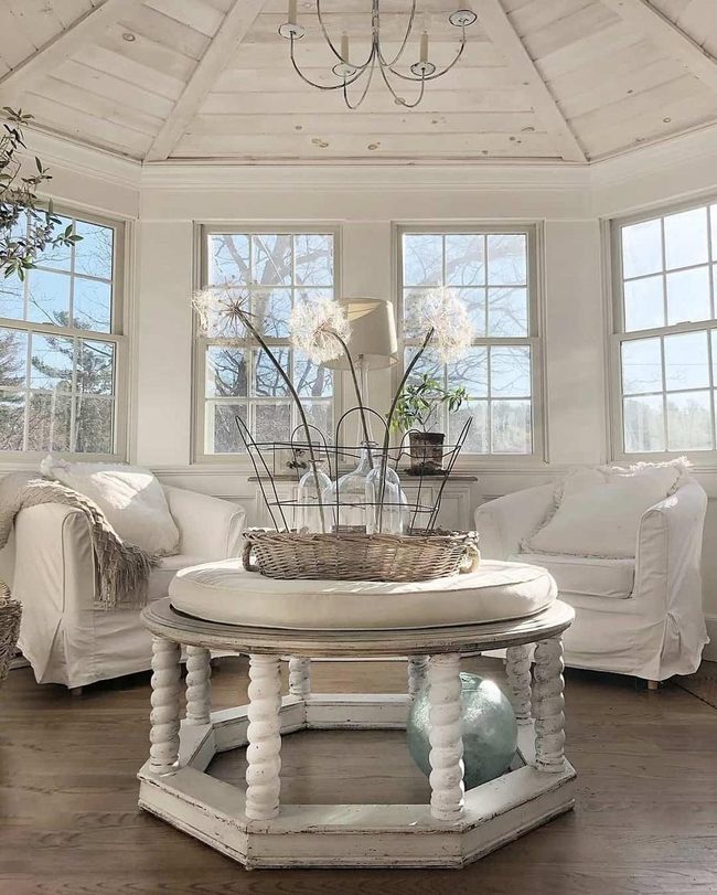 Sunlit Space With Gleaming Metal Chandelier
