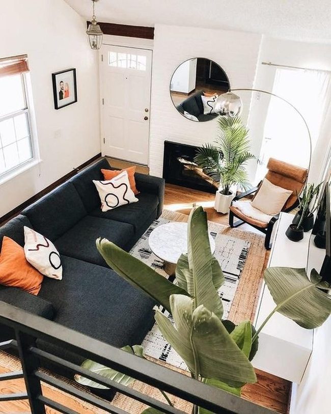 Sunlit Room, Orange Pillows, Mirror Glow