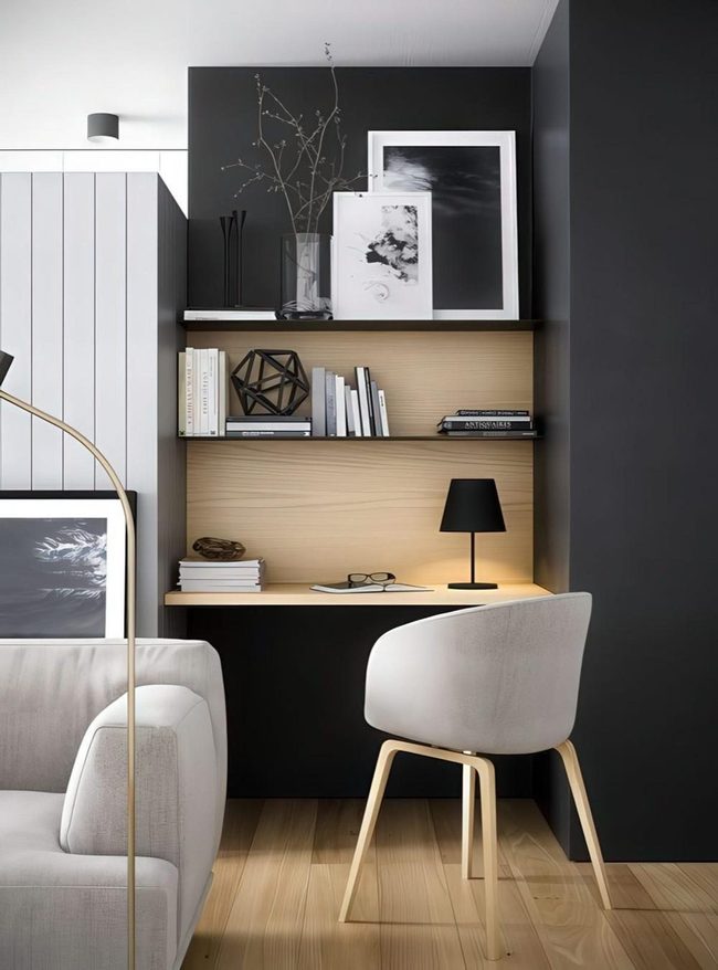 Pale Wood Workspace Against Dark Walls