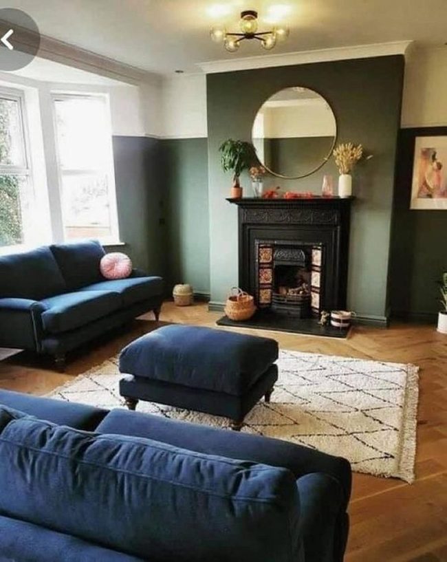 Dark Green Walls Black Fireplace Blue Sofas