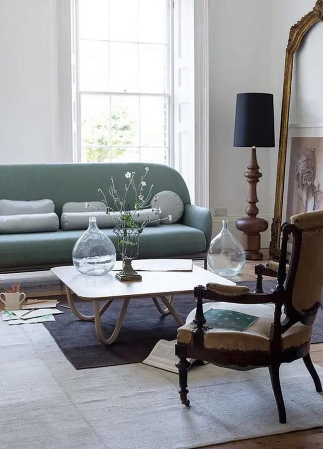 Green Curved Sofa Sunlit Interior