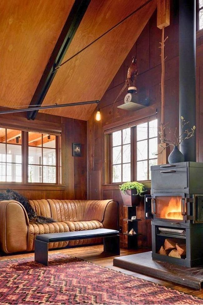 Deep Green Walls With Grain Stove
