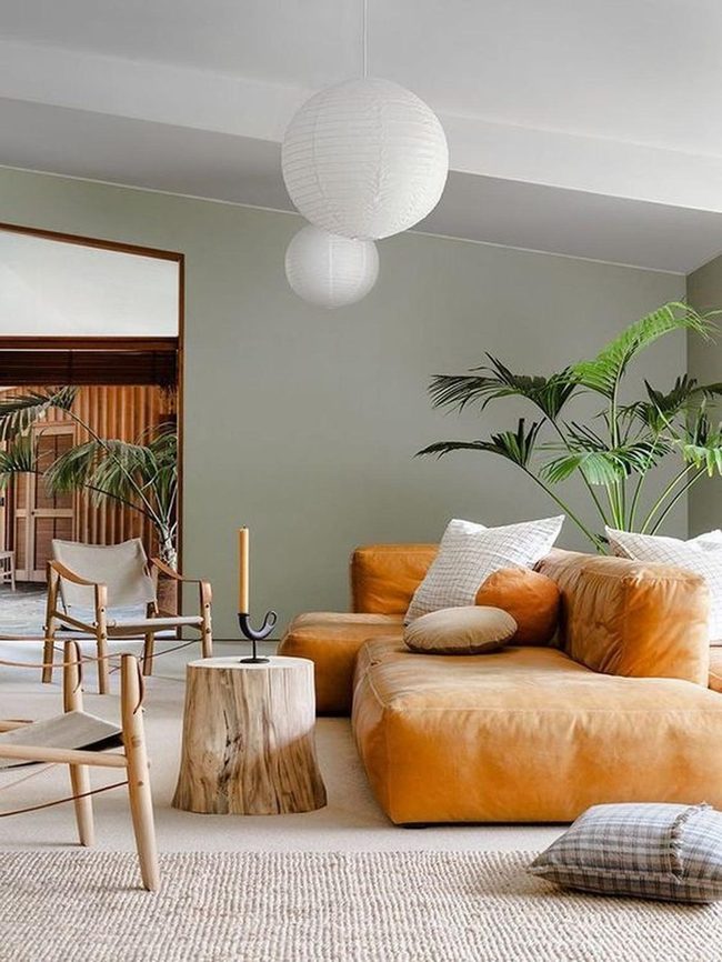 Orange Leather Sofa With Green Walls