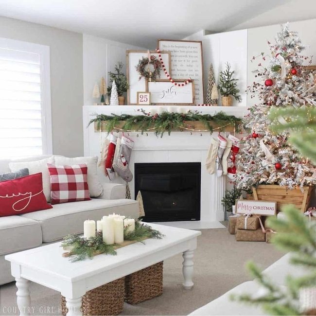 White Fireplace With Evergreen Garlands