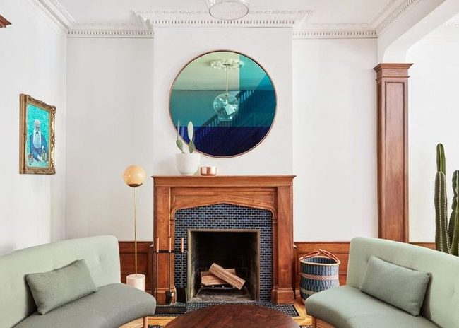 Curved Green Couches, Iridescent Mirror