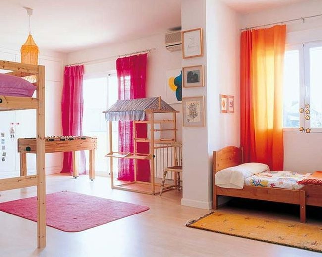 Sunny Pink Playroom With Wood Details