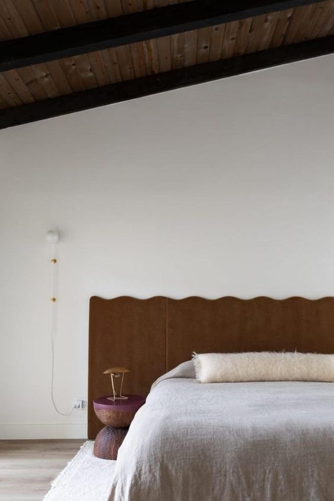 Wooden Beams Meet Wavy Headboard