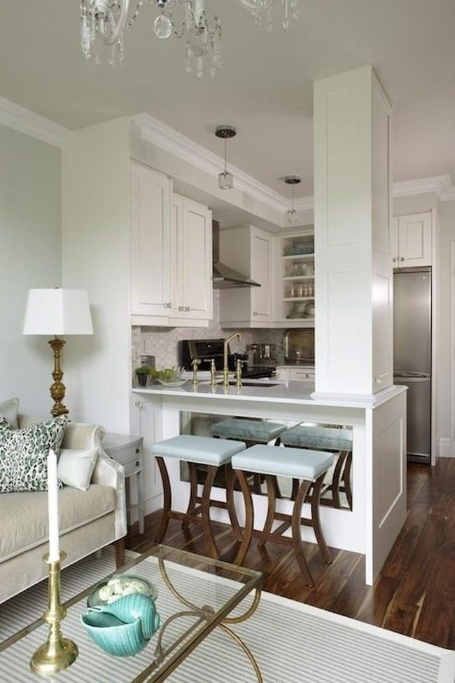 White Kitchen Meets Warm Wood Floors