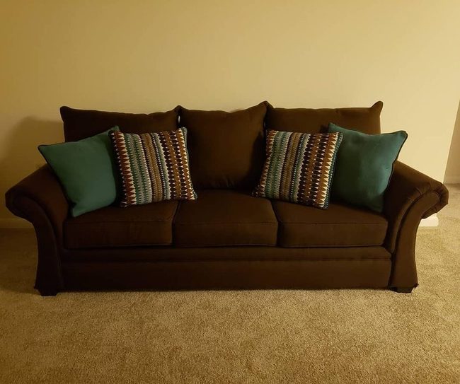 Brown Couch Teal Patterned Pillows