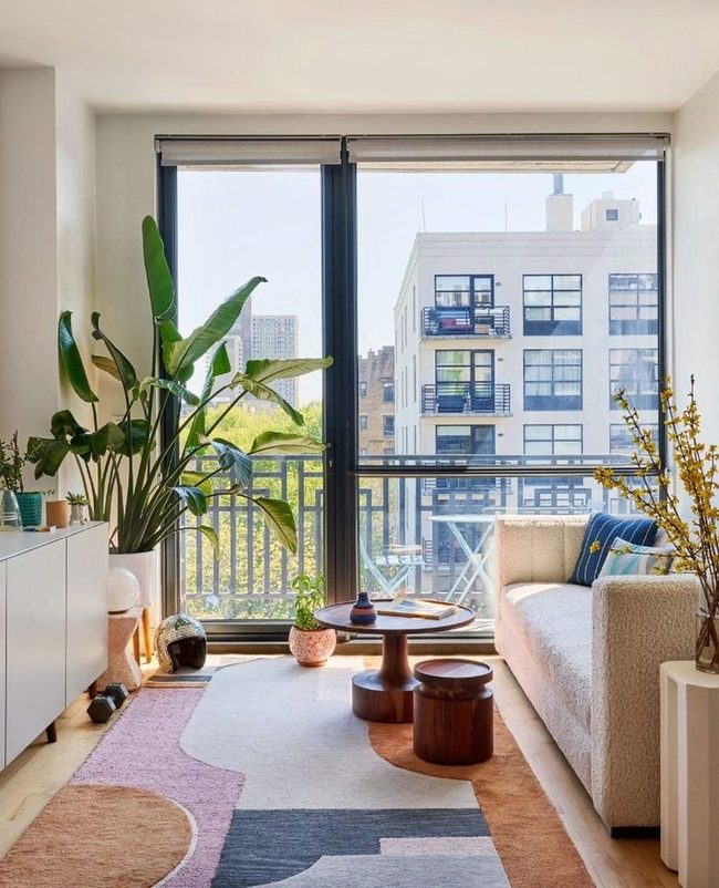 Sunlit White Living Room With Colorful Accents