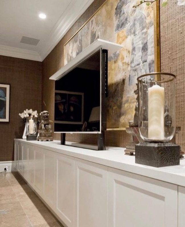 Hidden Tv Cabinet With Molding Details