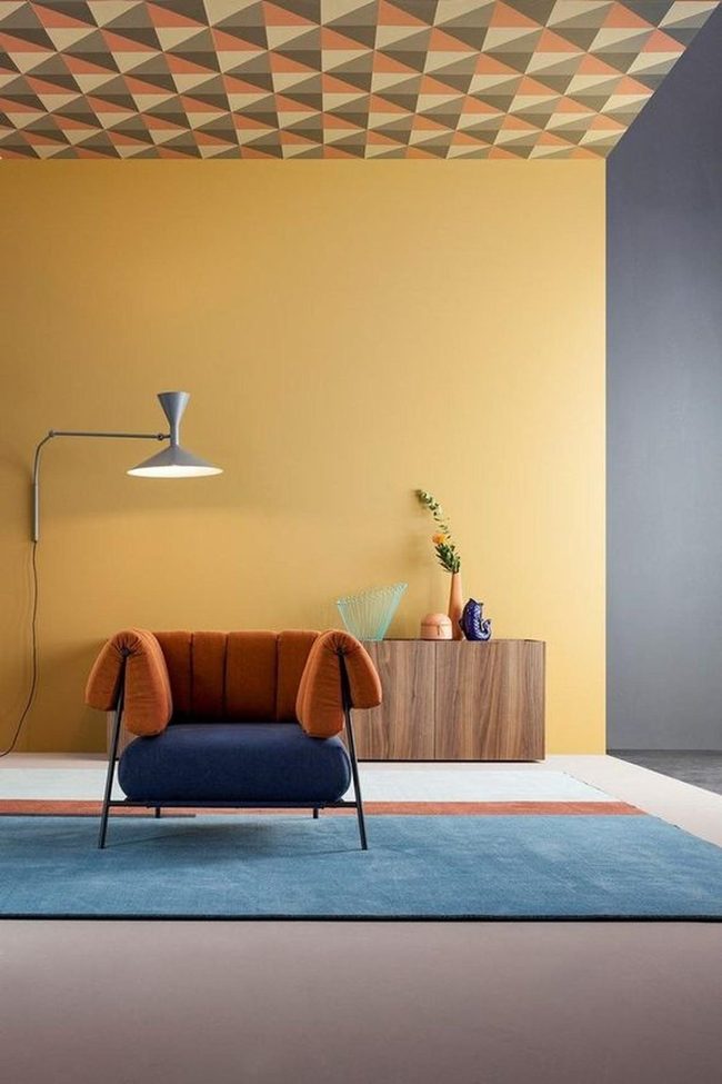 Yellow Walls Meet Modern Blue Chairs