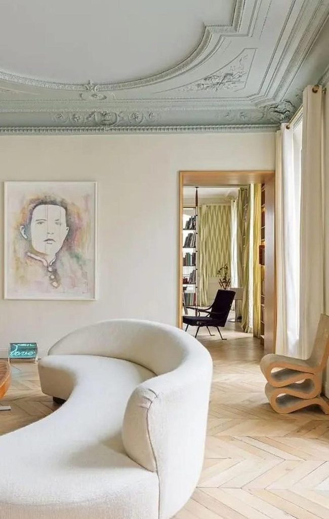 Curved Sofa Meets Green Ceiling
