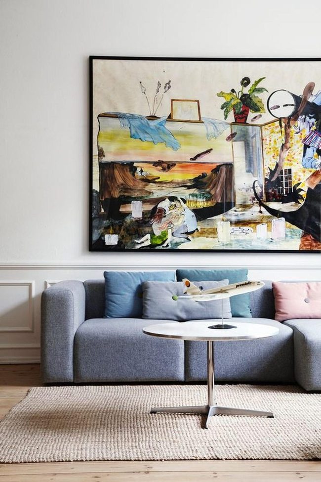 Gray Sofa With Vibrant Wall Art